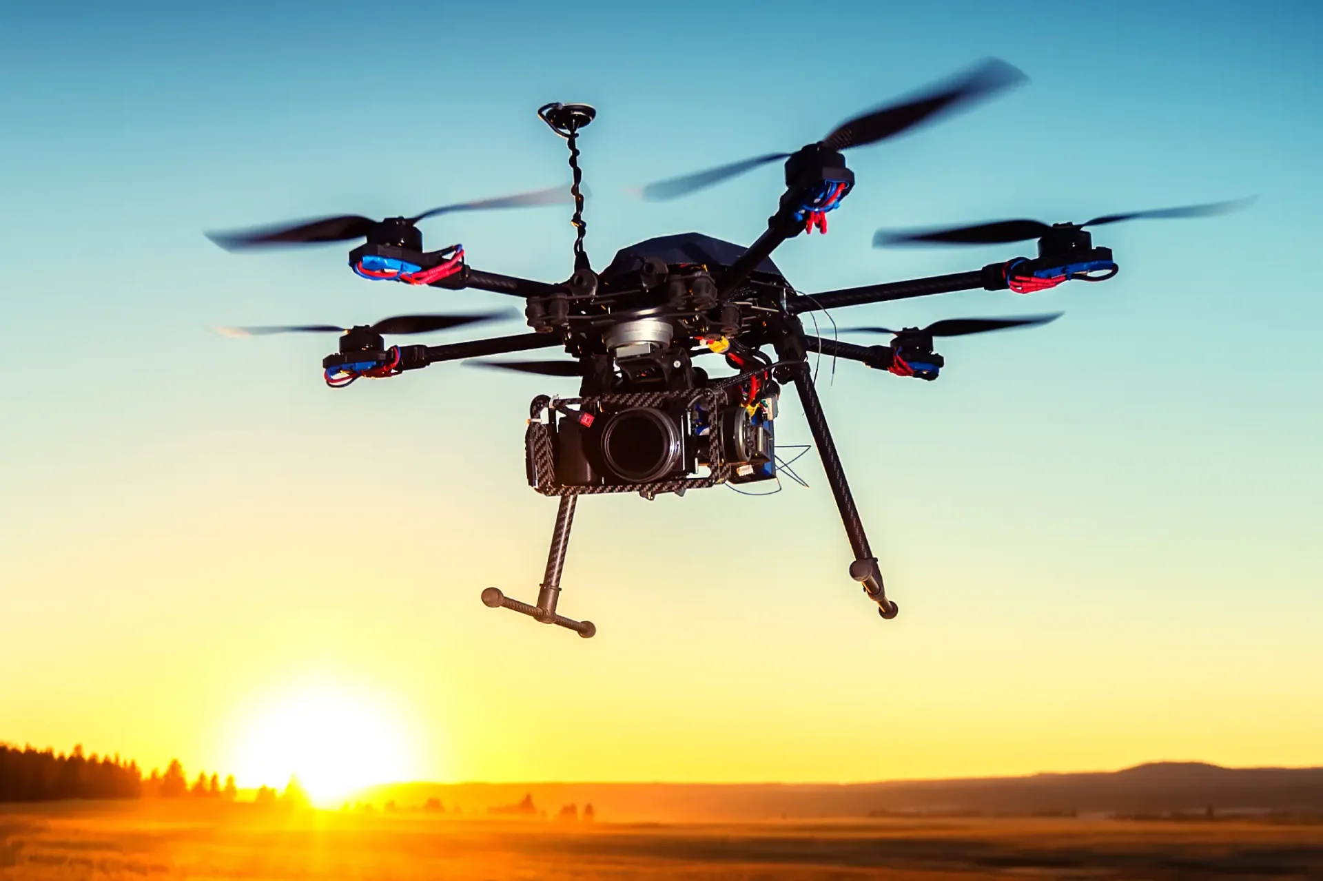 A camera flying in the air with two other cameras.